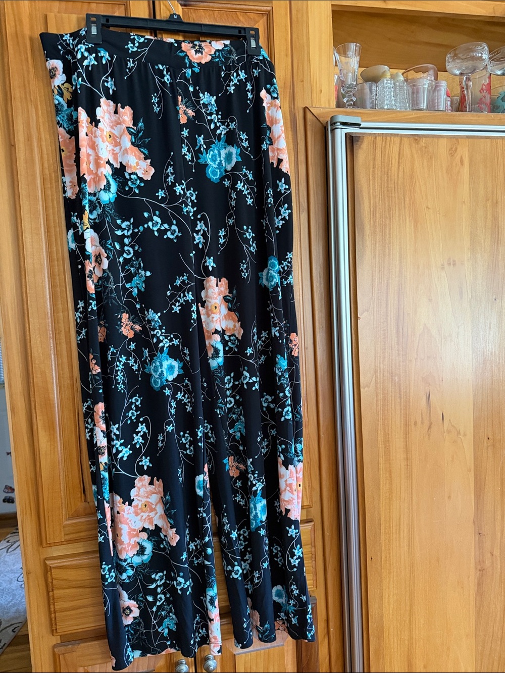 Chico’s black floral palazzo pants. Chico’s size 3 is standard XL.